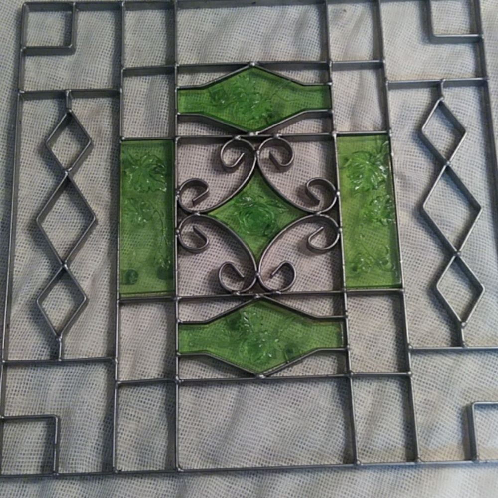 Wrought Iron wall plaque.